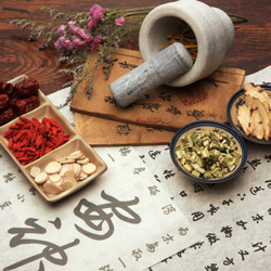 herbs, with a mortar and pestle, and Mandarin writing